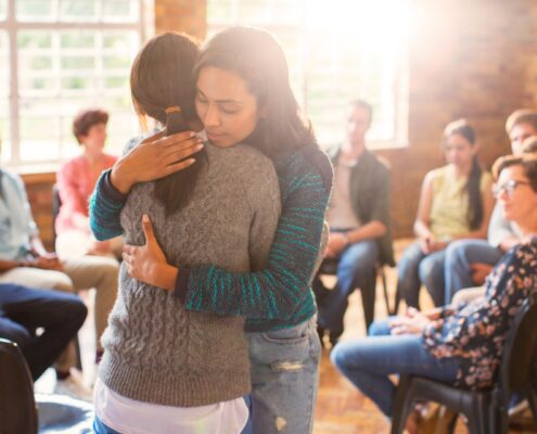 Individual vs group therapy, group therapy provides peer support
