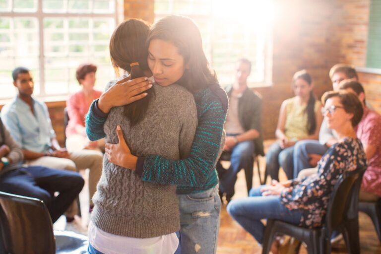 Individual vs group therapy, group therapy provides peer support